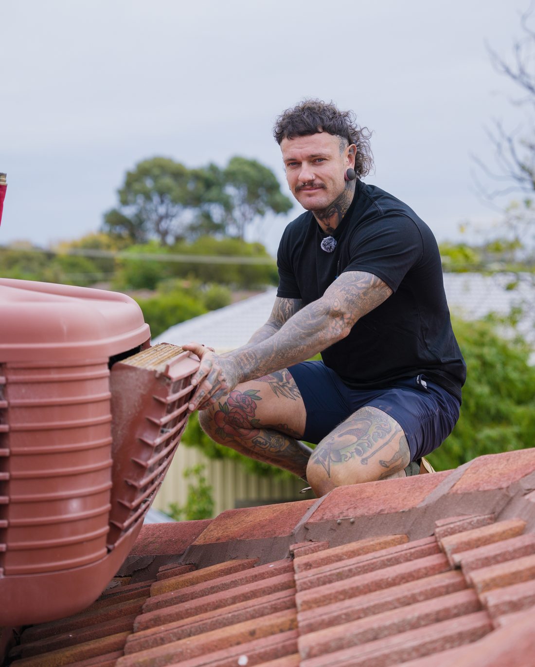 Ruben Bird working on a roof mounted evaporative cooler