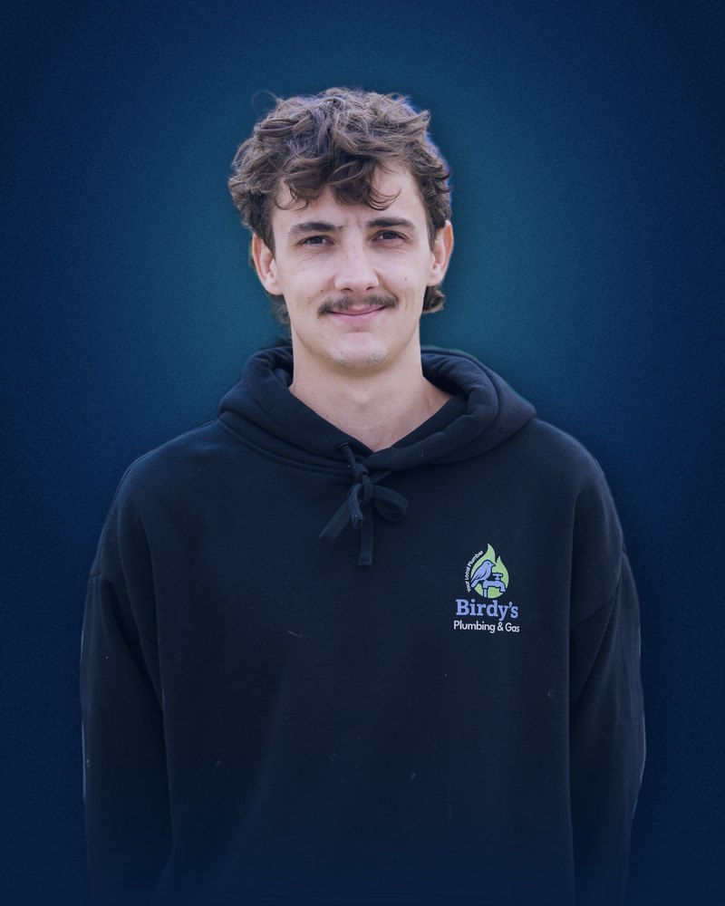 Birdy's Plumbing & Gas team member in a Birdy's hoodie